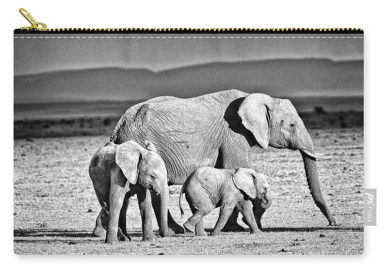 Africa Zip Pouch featuring the photograph African Elephant in the Masai Mara #2 by Perla Copernik