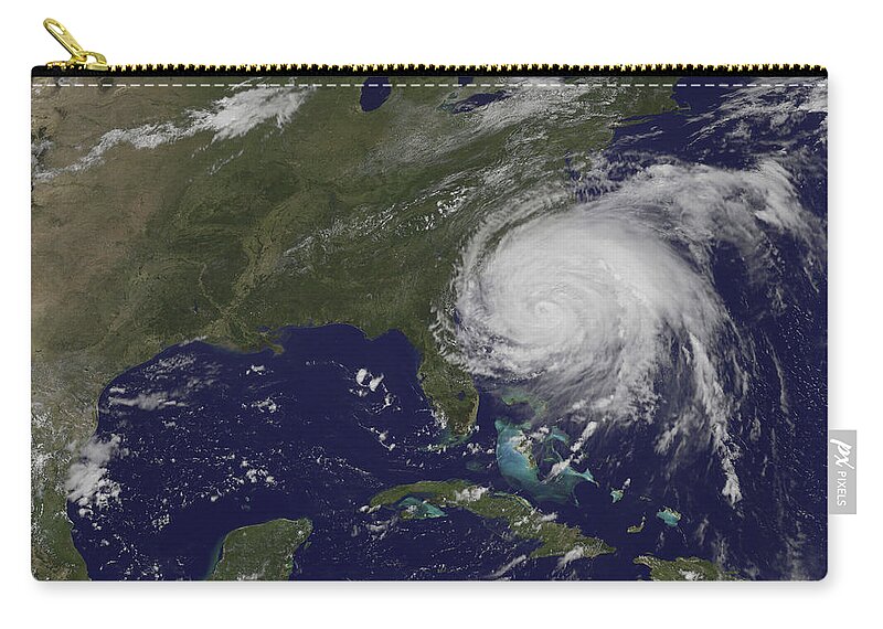 East Coast Zip Pouch featuring the photograph Satellite View Of Hurricane Irene #1 by Stocktrek Images