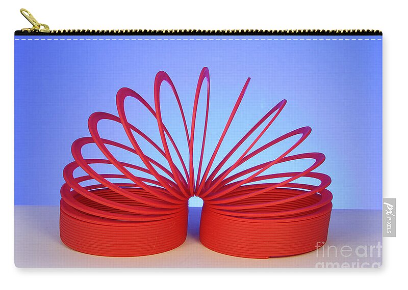 Helical Zip Pouch featuring the photograph Slinky #1 by Photo Researchers, Inc.