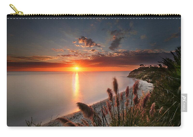 Sunset Zip Pouch featuring the photograph Sunset at Swamis Beach 2 by Larry Marshall
