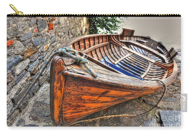 Boat Zip Pouch featuring the photograph Wood boat #1 by Mats Silvan