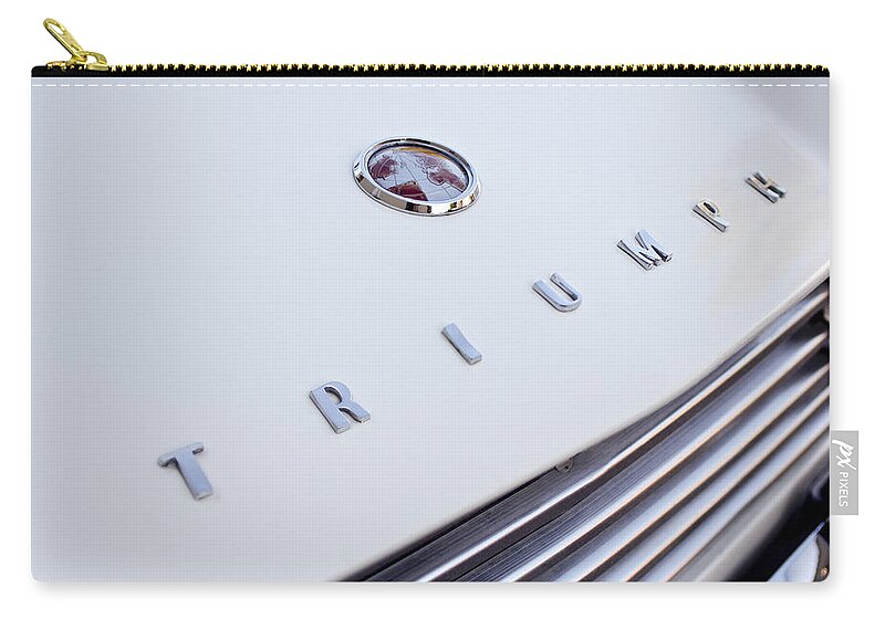 1965 Triumph Tr4 A Zip Pouch featuring the photograph 1965 Triumph TR4 A Hood Emblem by Jill Reger