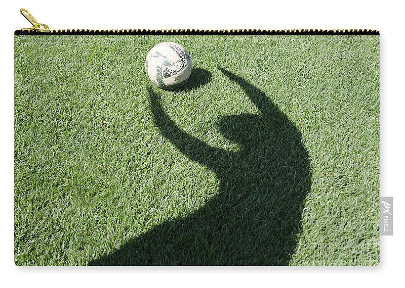 Football Zip Pouch featuring the photograph Shadow playing football #2 by Mats Silvan