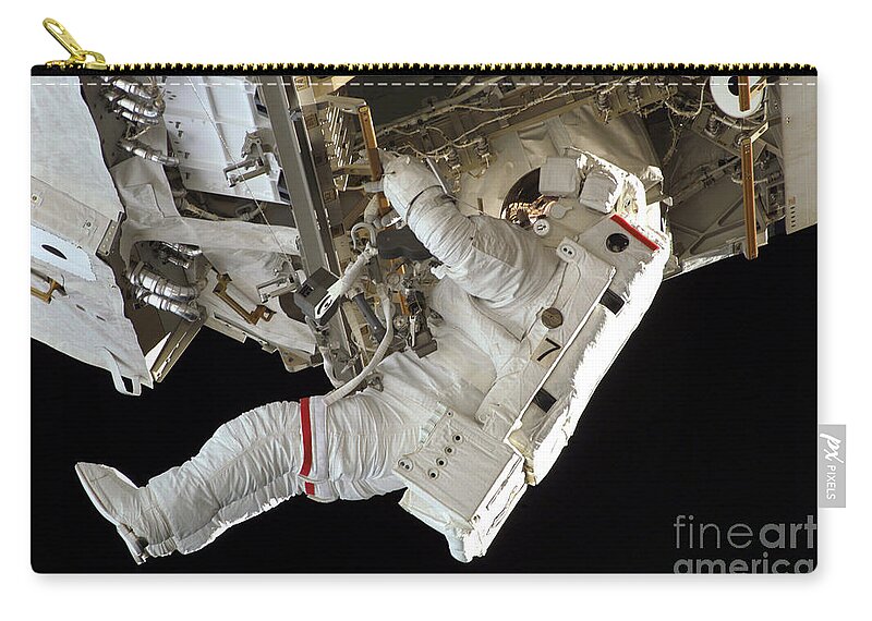 Astronomy Zip Pouch featuring the photograph Space Shuttle Discovery #3 by Nasa