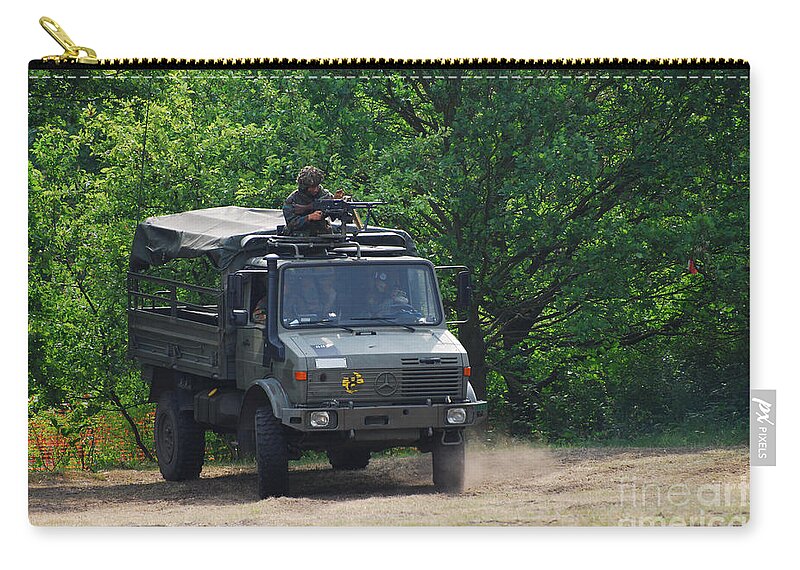 Unimog Zip Pouch featuring the photograph A Unimog Vehicle Of The Belgian Army by Luc De Jaeger