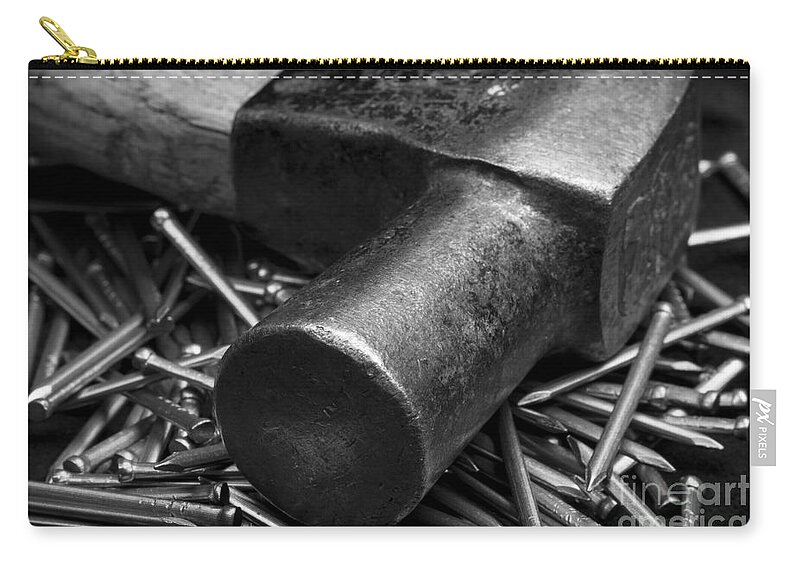 Clare Bambers Zip Pouch featuring the photograph Carpenter Handyman Hammer and Nails by Clare Bambers