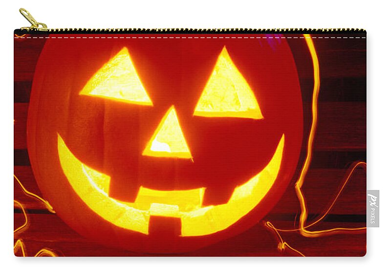 Pumpkin Zip Pouch featuring the photograph Carved pumpkin smiling by Garry Gay