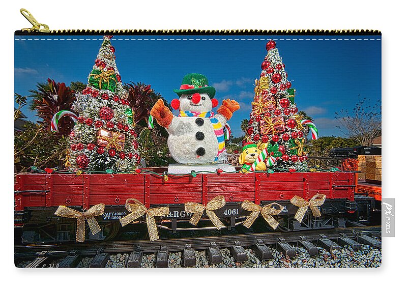 Snowman Zip Pouch featuring the photograph Christmas Snowman On Rails by Christopher Holmes