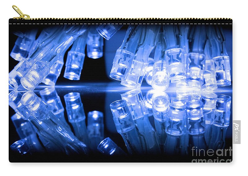 Light Zip Pouch featuring the photograph Cold blue LED lights closeup by Simon Bratt