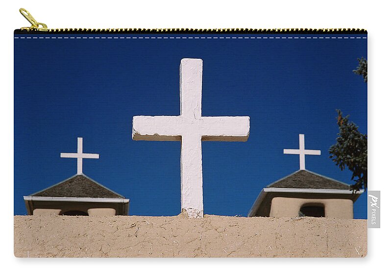Taos Zip Pouch featuring the photograph Crosses Of San Francisco De Asis by Ron Weathers