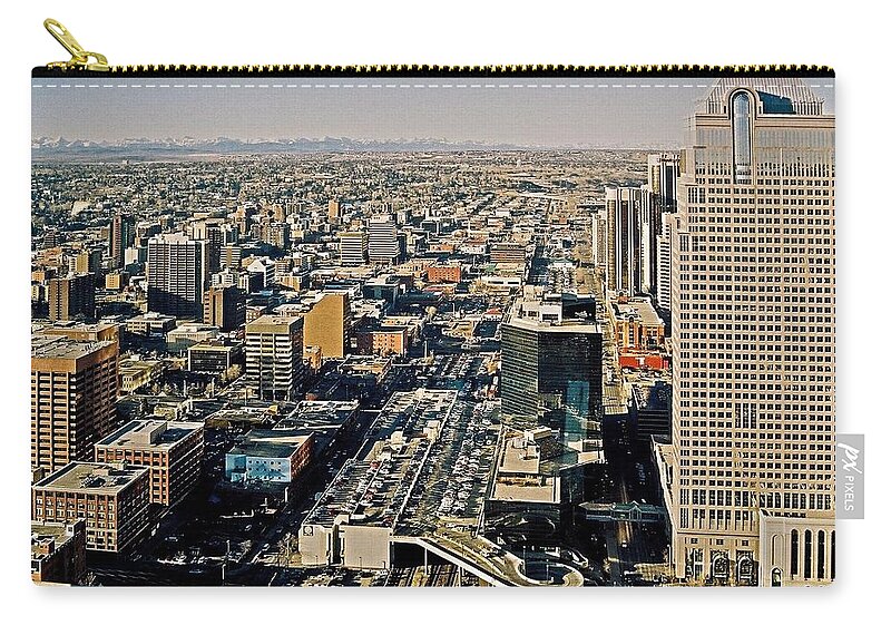 North Armerica Zip Pouch featuring the photograph Downtown Calgary with the Canadian Rockies ... by Juergen Weiss