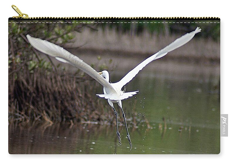 Egret Zip Pouch featuring the photograph Egret in Flight by Joe Faherty