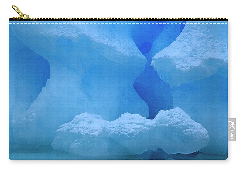 Hhh Zip Pouch featuring the photograph Eroded Base Of Iceberg In Snowstorm by Colin Monteath