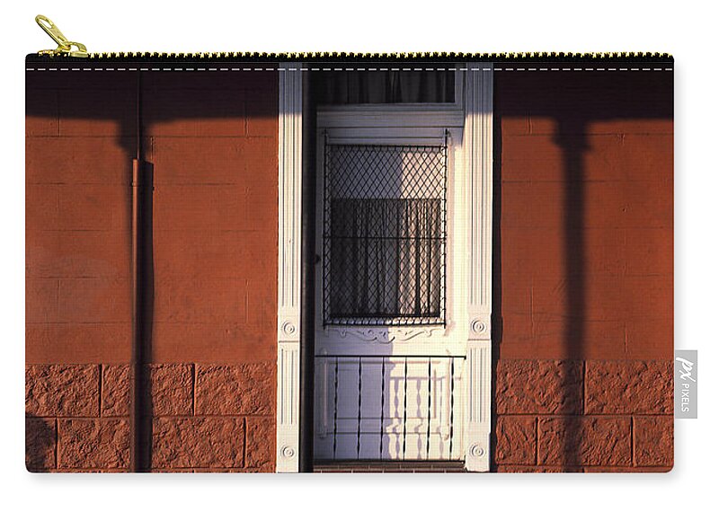 French Quarter Zip Pouch featuring the photograph French Quarter door and shadows New Orleans by Mike Nellums