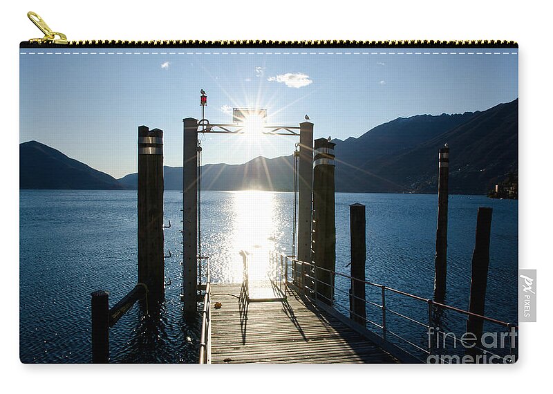 Port Zip Pouch featuring the photograph Harbor and sun by Mats Silvan