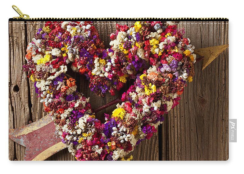 Heart Zip Pouch featuring the photograph Heart wreath with weather vane arrow by Garry Gay