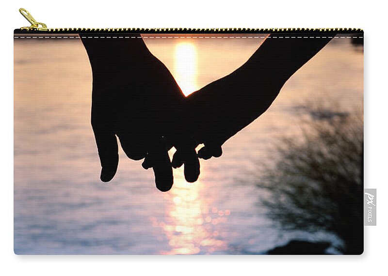 Vertical Zip Pouch featuring the photograph Holding Hands Silhouette by Cindy Singleton