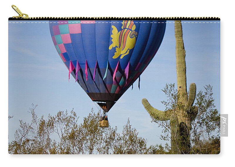 Balloon Zip Pouch featuring the photograph Hot Air Balloon Flight over the Lush Arizona Desert by James BO Insogna