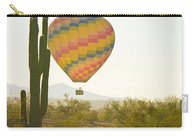 Arizona Carry-all Pouch featuring the photograph Hot Air Balloon over the Arizona Desert With Giant Saguaro by James BO Insogna
