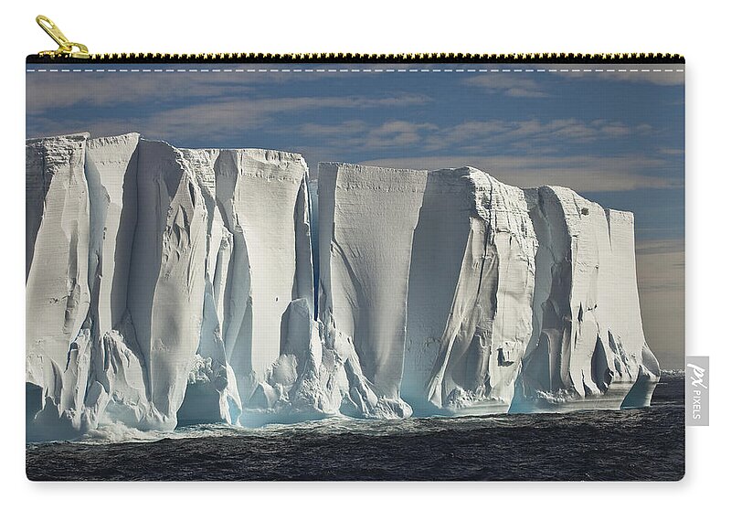 00427995 Zip Pouch featuring the photograph Iceberg Showing Annual Layers Of Snow by Colin Monteath