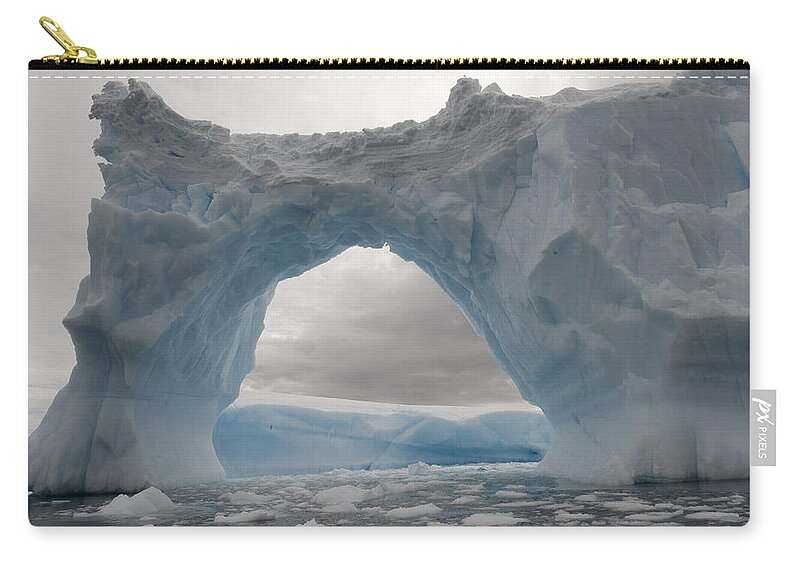 Mp Zip Pouch featuring the photograph Iceberg With A Natural Arch, Antarctic by Flip Nicklin