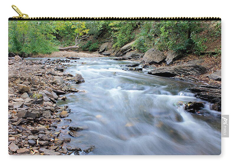 Minnehaha Creek Zip Pouch featuring the photograph Just Passing Through by Kristin Elmquist