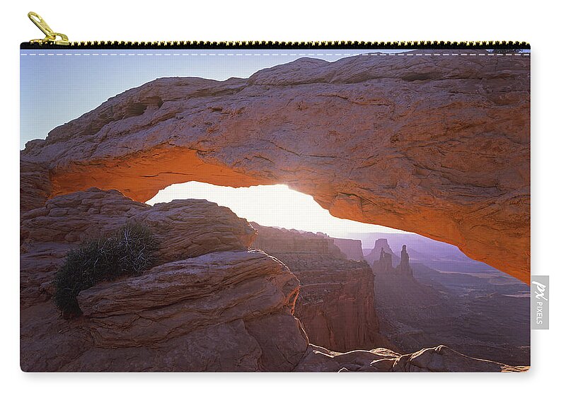 00175853 Zip Pouch featuring the photograph Mesa Arch At Sunset From Mesa Arch by Tim Fitzharris