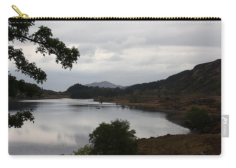 Evening Mood Zip Pouch featuring the photograph Moody Lake - Ring of Kerry - Ireland by Christiane Schulze Art And Photography