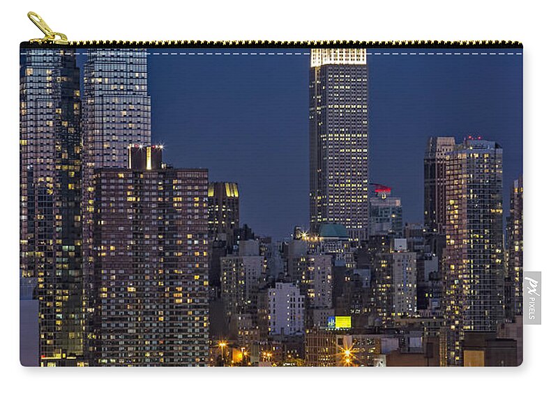 New York City Zip Pouch featuring the photograph Moonrise along the Empire State Building by Susan Candelario
