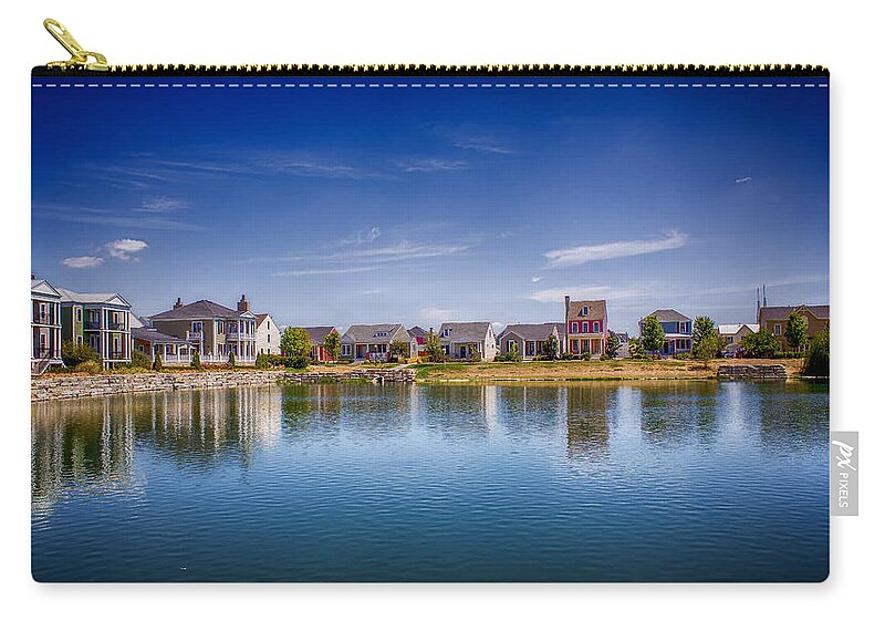 Missouri Zip Pouch featuring the photograph New Town on the Lake by Bill and Linda Tiepelman
