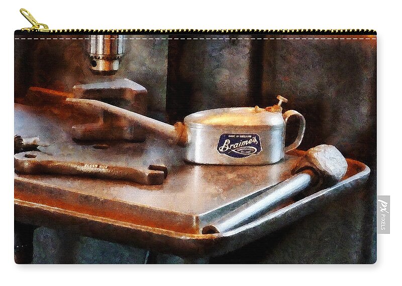 Construction Zip Pouch featuring the photograph Oil Can and Wrench by Susan Savad