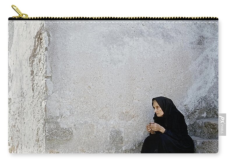 Dalmatia Zip Pouch featuring the photograph Old age woman sitting by Juan Carlos Ferro Duque