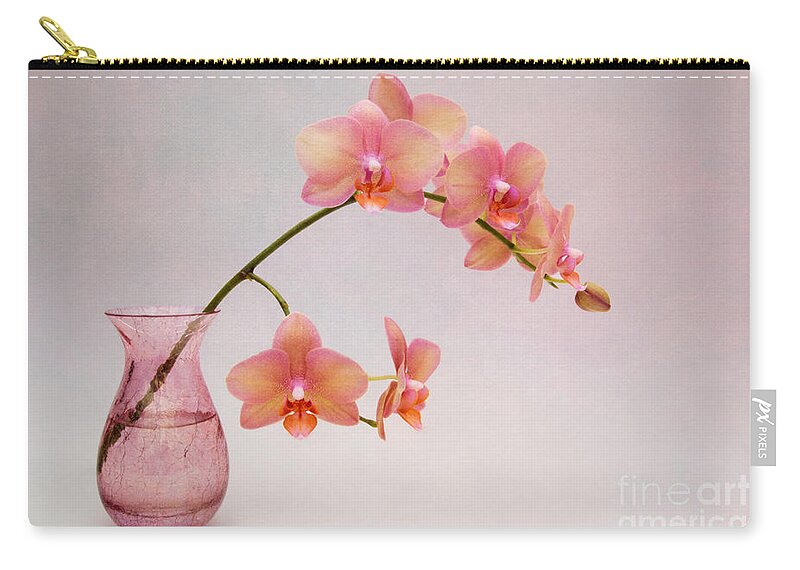 Orchid Zip Pouch featuring the photograph Orchids in a Pink Vase by Ann Garrett