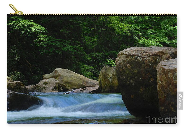 Painted Zip Pouch featuring the photograph Painted Rocks by Amanda Jones