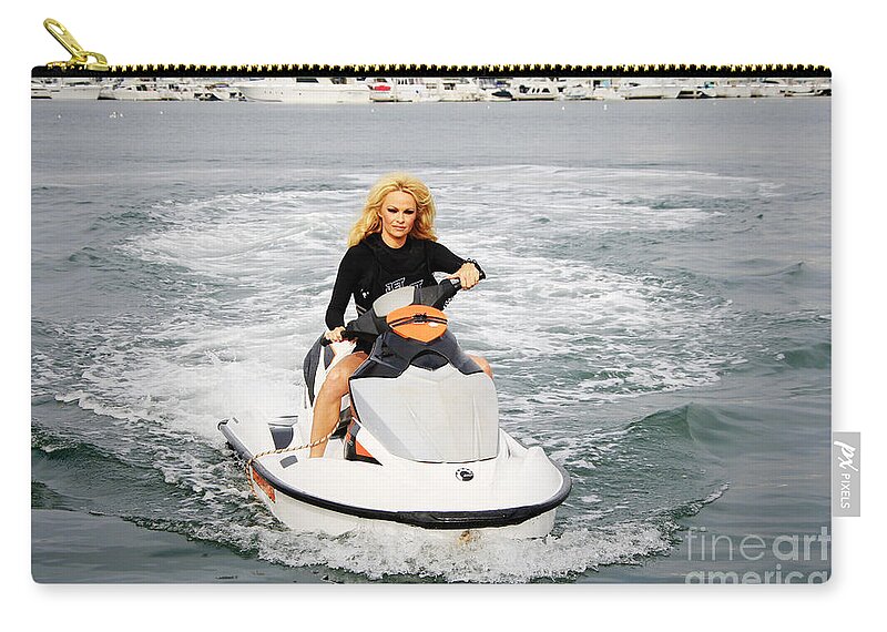 Pamela Anderson Zip Pouch featuring the photograph Pamela Anderson is a jet ski vixen by Nina Prommer