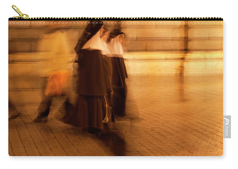 Madrid Zip Pouch featuring the photograph Piety In Motion by Lorraine Devon Wilke