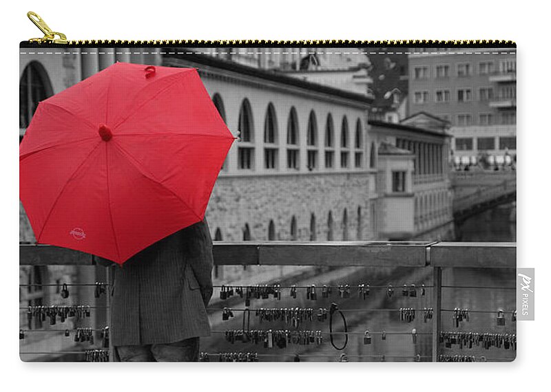 Red Zip Pouch featuring the photograph Rainy days in Ljubljana by Ian Middleton
