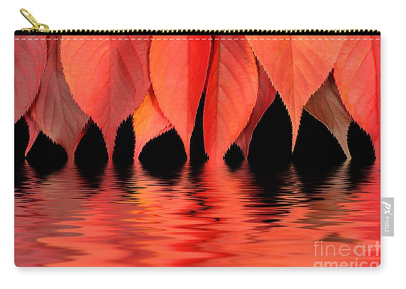 Flames Zip Pouch featuring the photograph Red autumn leaves in water by Simon Bratt