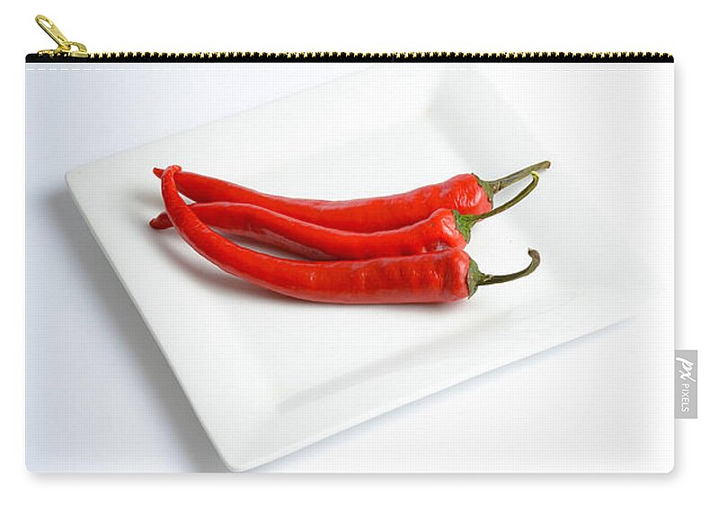 Arranged Zip Pouch featuring the photograph Red Chili Pepper by Photo Researchers, Inc.