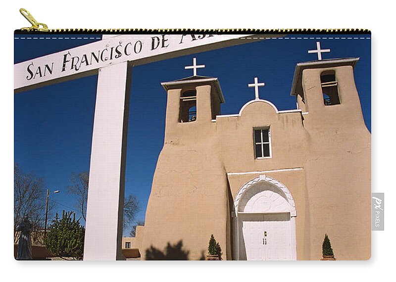 Taos Zip Pouch featuring the photograph San Francisco De Asis by Ron Weathers