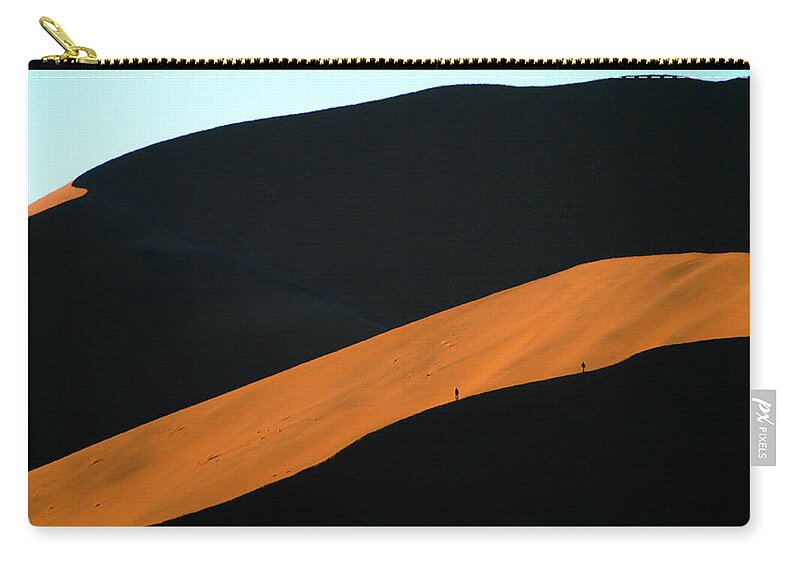 Africa Zip Pouch featuring the photograph See how big by Alistair Lyne