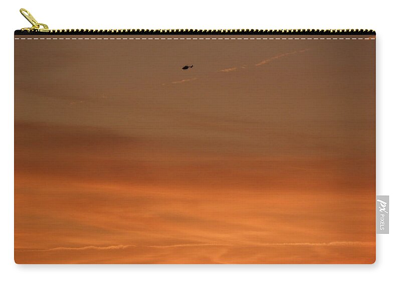 Sunset Zip Pouch featuring the photograph Sky Sunset With A Helicopter In The Distance by Kim Galluzzo