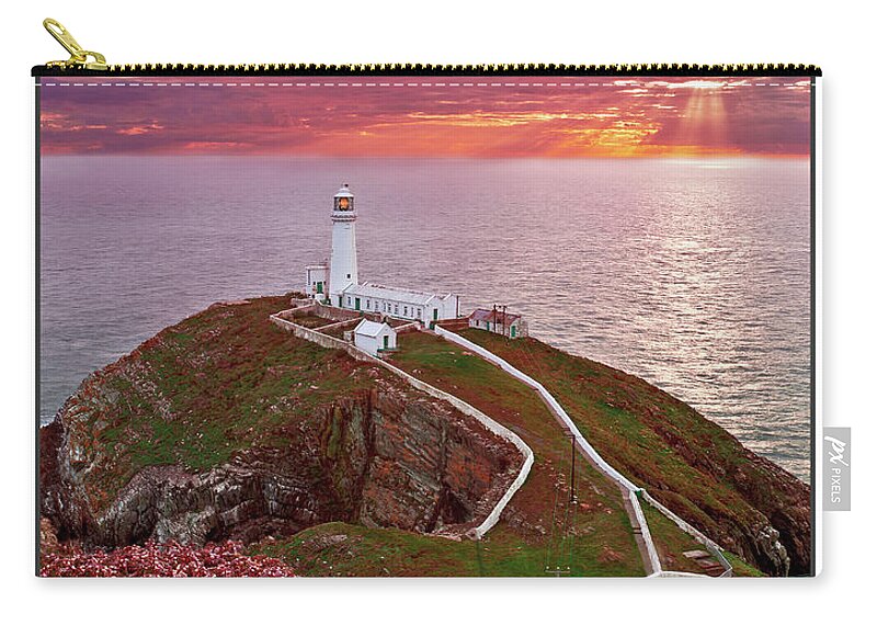 Sunset Zip Pouch featuring the photograph South Stack Lighthouse by B Cash