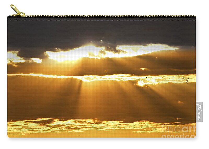 Sunset Zip Pouch featuring the photograph Sun rays at sunset sky by Elena Elisseeva