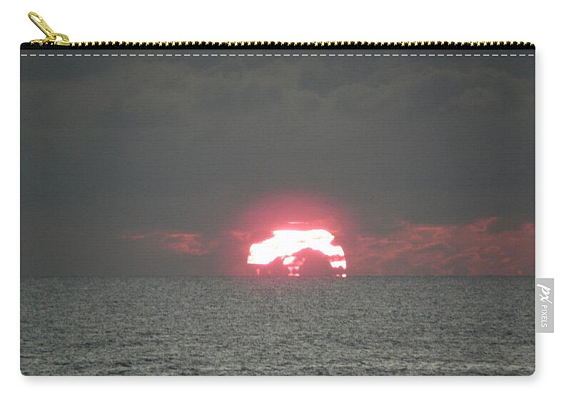 Sunrise Zip Pouch featuring the photograph Sunrise Over The Atlantics Horizon by Kim Galluzzo