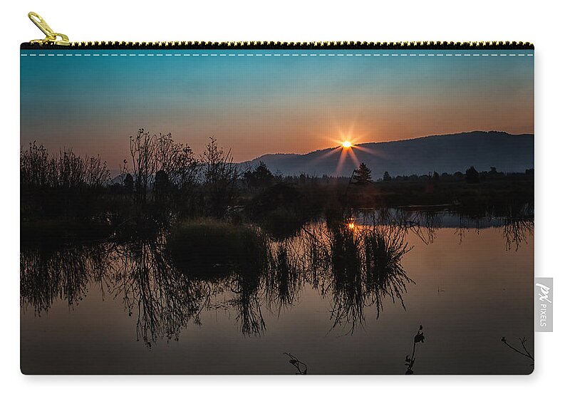 2012 Zip Pouch featuring the photograph Sunrise over the Beaver Pond by Ronald Lutz