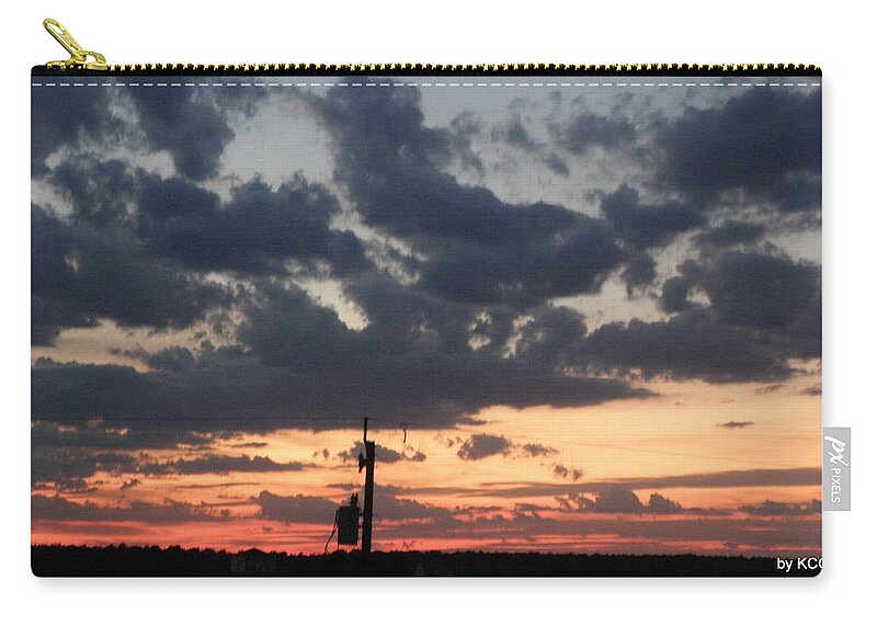 Sunset Zip Pouch featuring the photograph Sunset over the Outer Banks by Kim Galluzzo