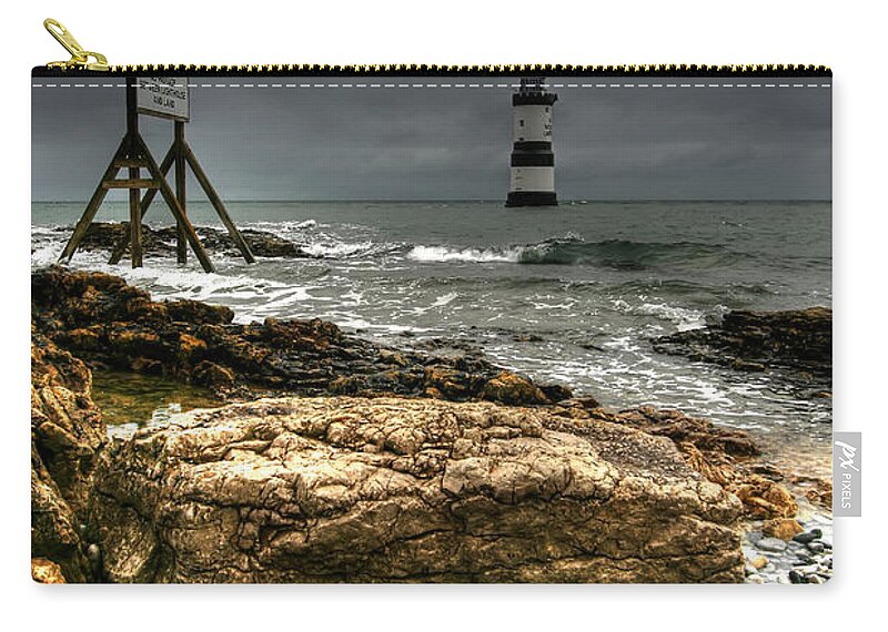 Anglesey Zip Pouch featuring the photograph Trwyn Du Lighthouse by Adrian Evans