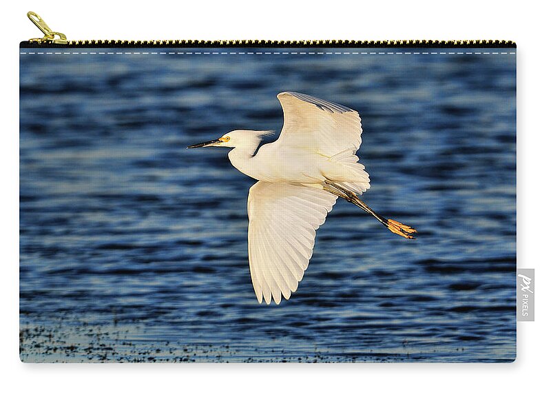 Snowy Zip Pouch featuring the photograph Turning to the evening light by Bill Dodsworth