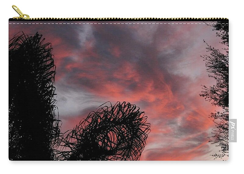 Nature Zip Pouch featuring the photograph Windswept Clouds by Peggy Urban